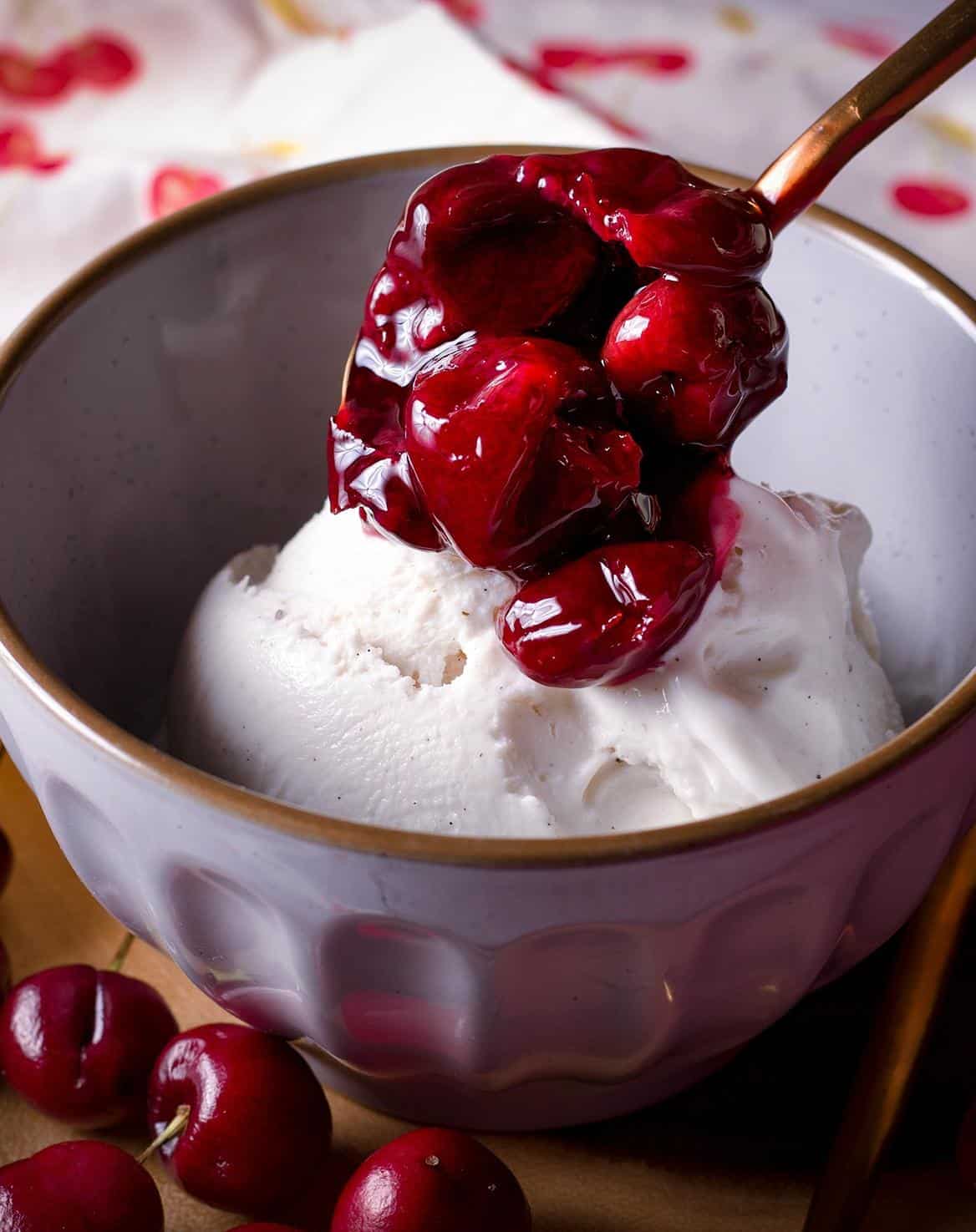  A scoop of vanilla ice cream is the perfect complement to the sour cherries.