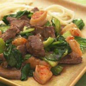  A sizzling skillet of spicy beef and shrimp with bok choy