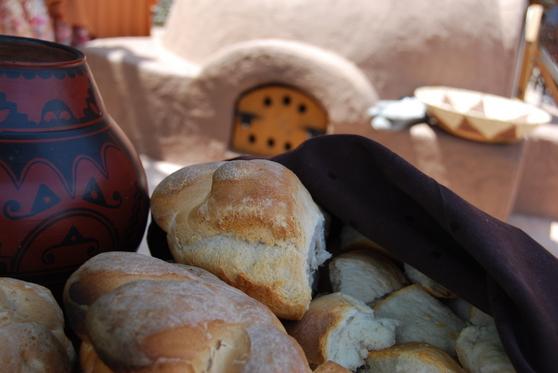  A slice of warm pueblo oven bread with butter is a simple yet satisfying snack