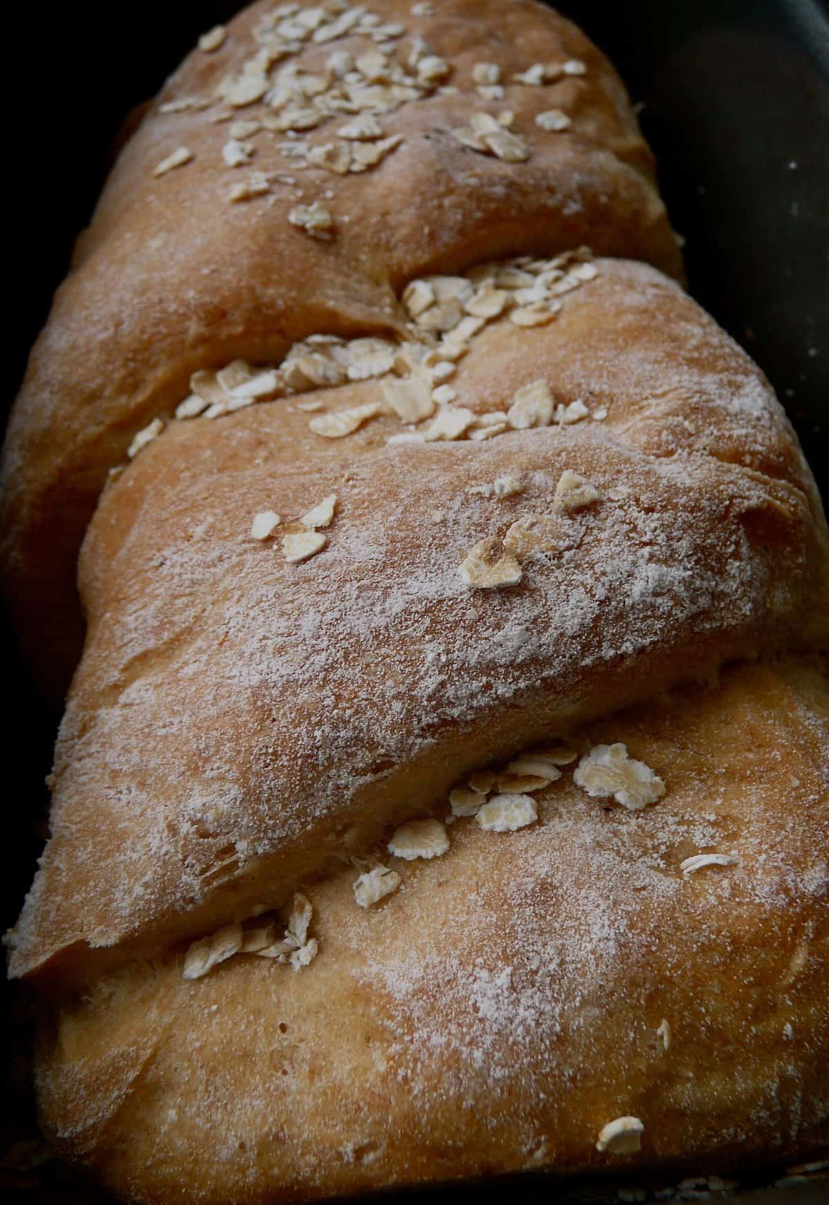  A warm slice of Irish Oatmeal Bread, perfect for a cozy breakfast or afternoon snack.