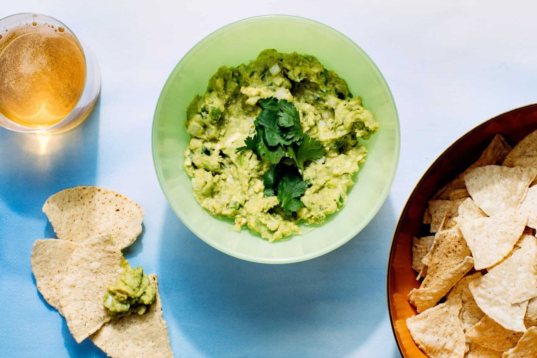  Bright greens and vibrant reds make this guacamole a feast for the eyes as well as the mouth.