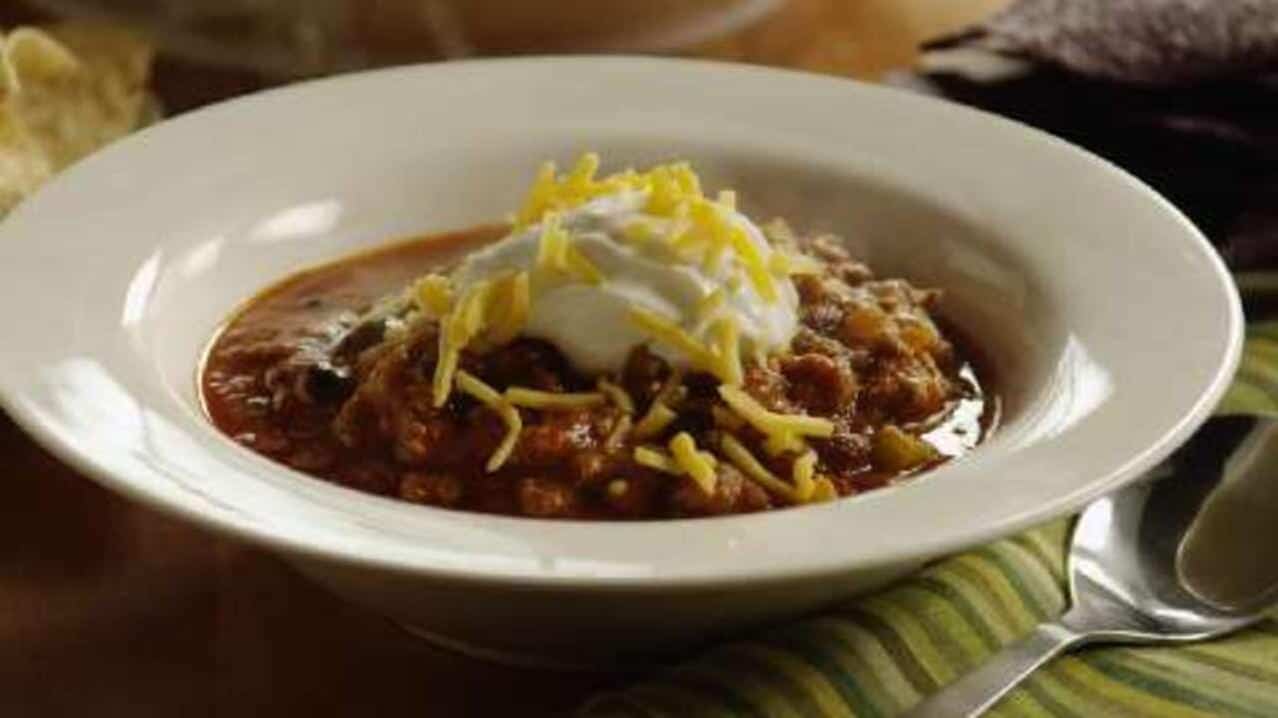  Don't forget to top your chili with shredded cheese for an extra burst of flavor.
