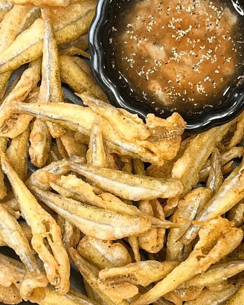  Get ready to dive into the ultimate seafood delight with Grammie Bea's Fried Smelts!