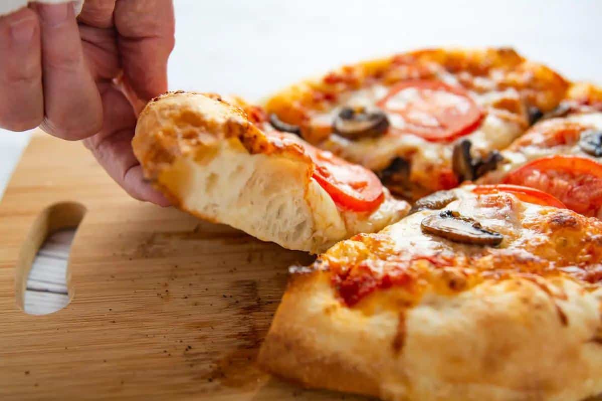  Homemade pizza has never been easier with this bread machine dough recipe.