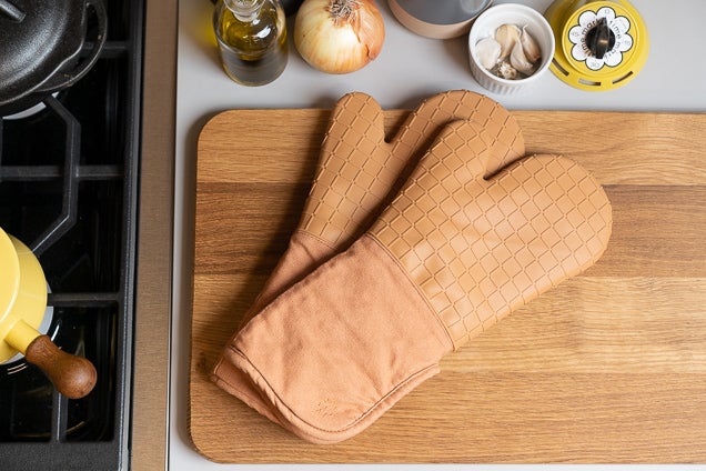 oven mitts as an easy rolling pin substitute,