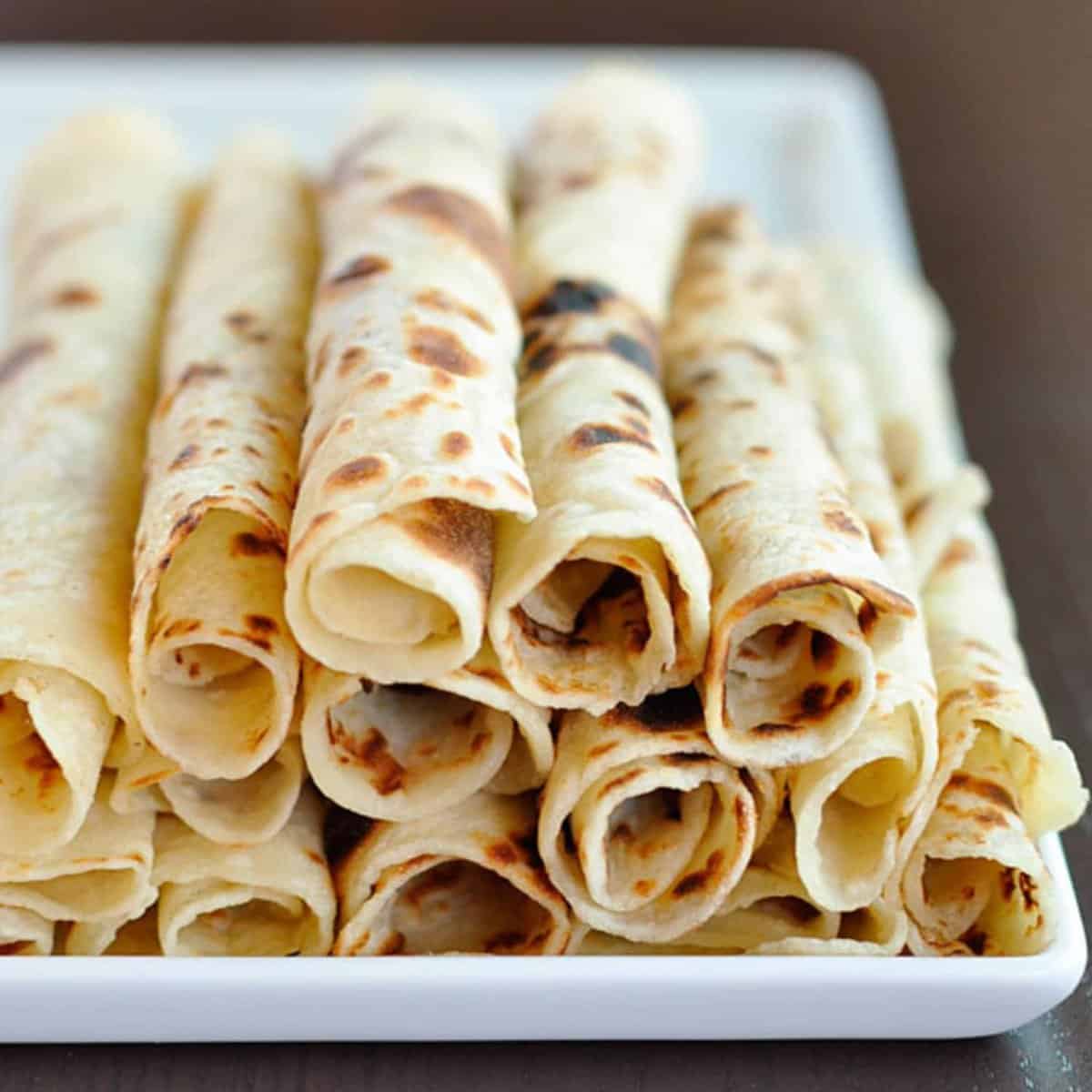  Spreading the creamy butter mixture onto each lefse