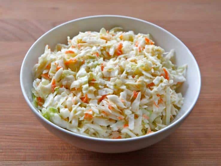  Tangy and sweet, this coleslaw is sure to be a crowd-pleaser.