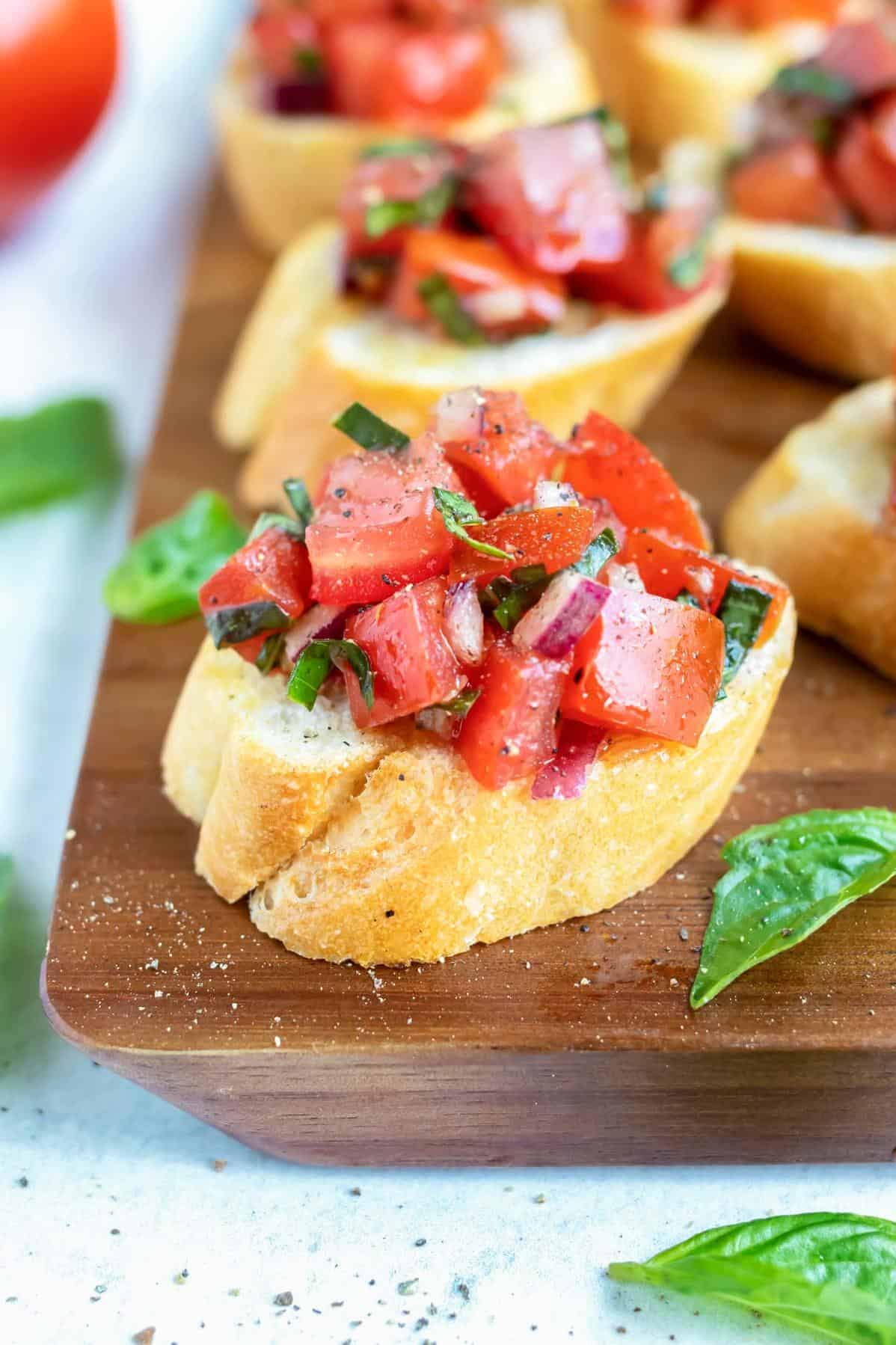  Toasted bread topped with a flavorful tomato mixture? Yes, please!